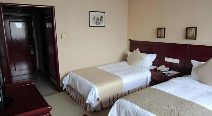 Bed in Meiyuan Hotel Hangzhou