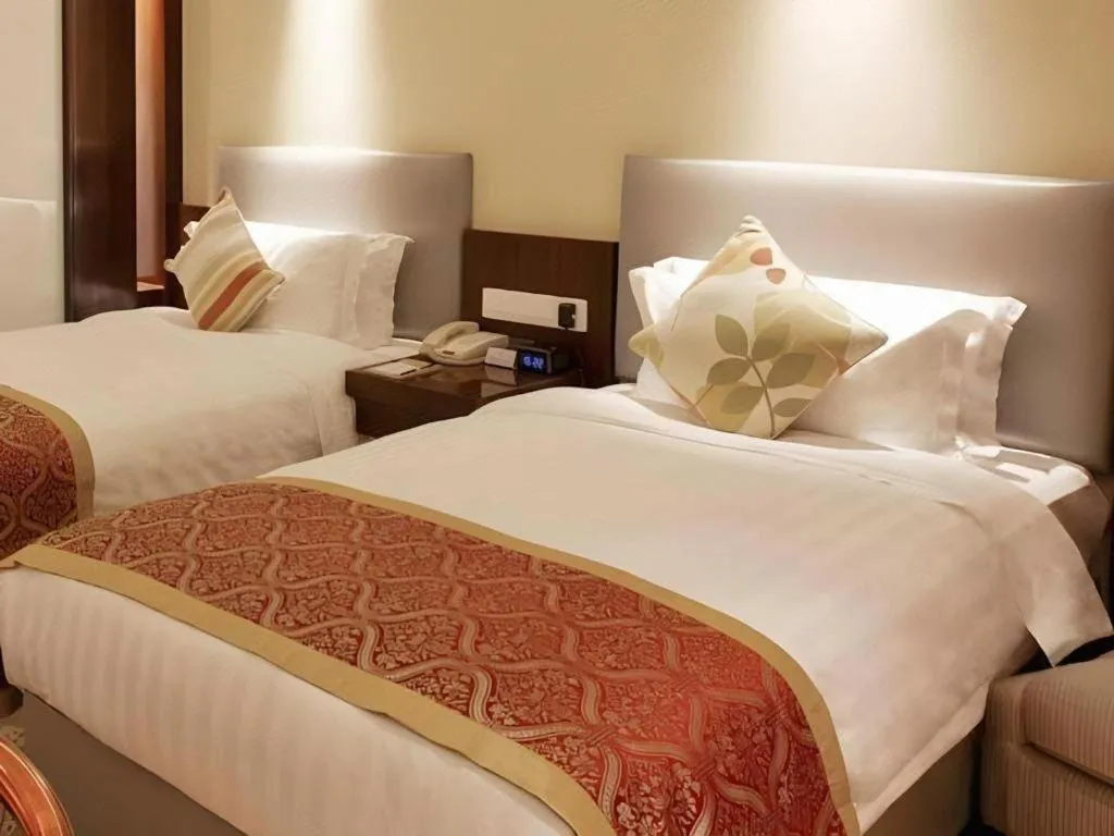 Bed in Meiyuan Hotel Hangzhou