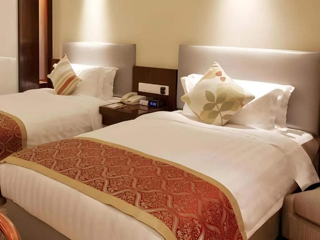 Bed in Meiyuan Hotel Hangzhou