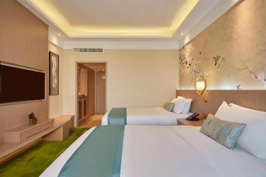 Bed in Meiyuan Hotel Hangzhou