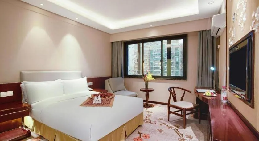 Bed in Meiyuan Hotel Hangzhou