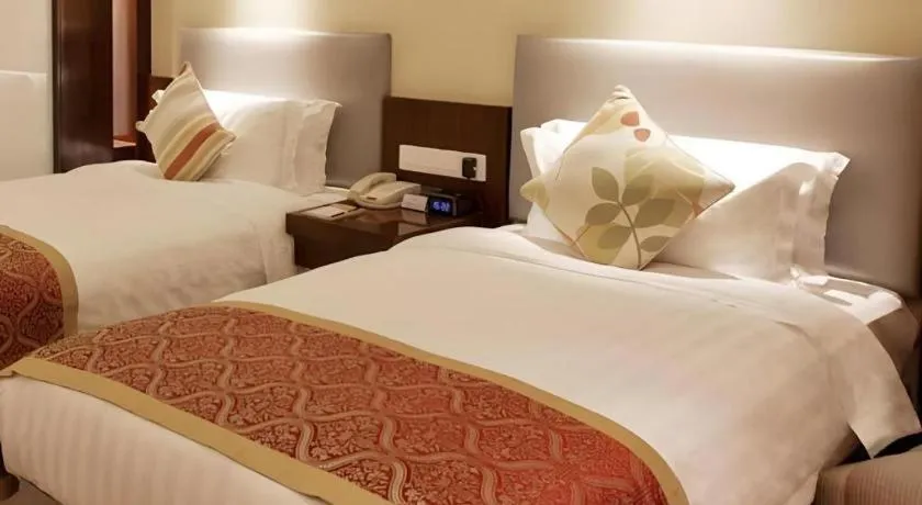 Bed in Meiyuan Hotel Hangzhou