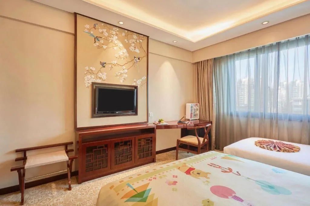 Bed in Meiyuan Hotel Hangzhou