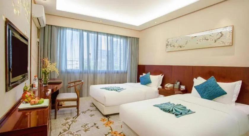 Bed in Meiyuan Hotel Hangzhou