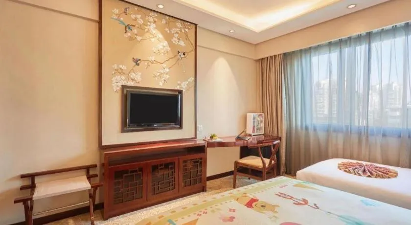 Bed in Meiyuan Hotel Hangzhou