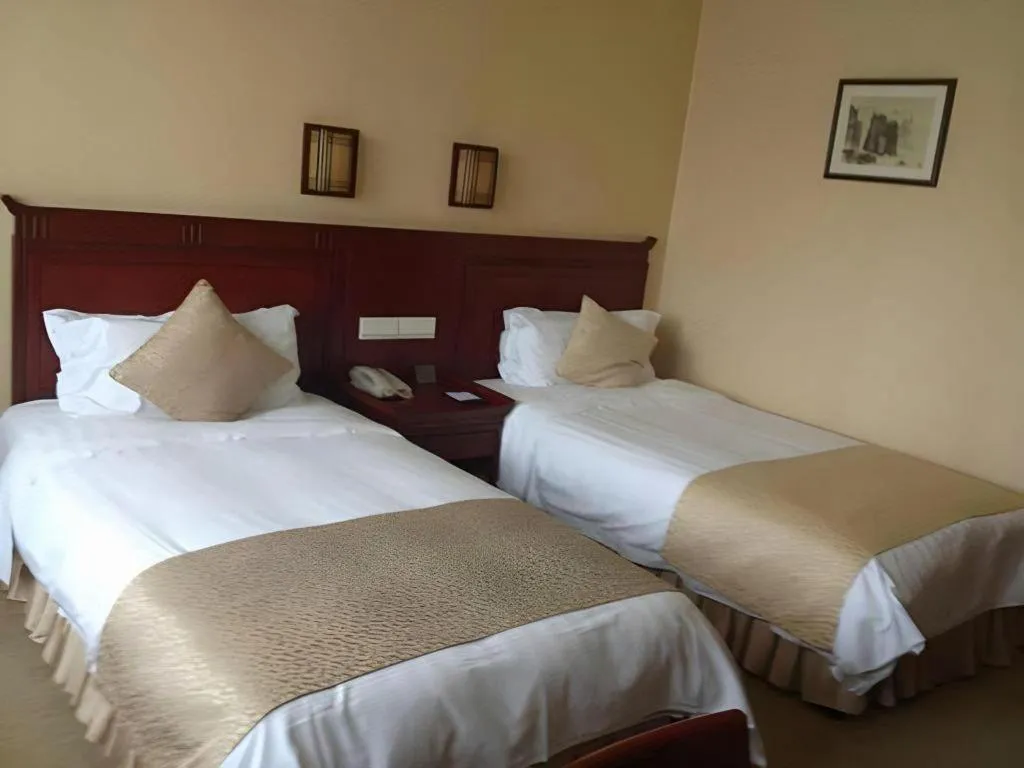 Bed in Meiyuan Hotel Hangzhou
