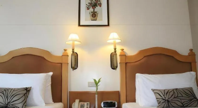 Bed in Palm Hotel Manila