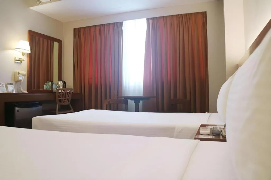 Bed in Palm Hotel Manila