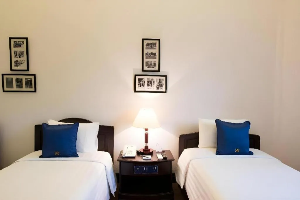 Bed in Hoa Binh Hotel