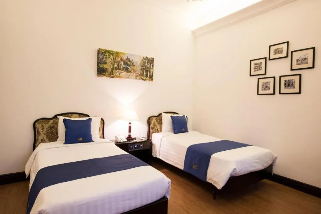 Bed in Hoa Binh Hotel