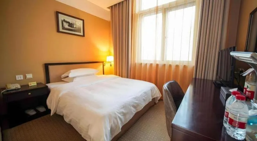 Bed in Dong Fang Hotel