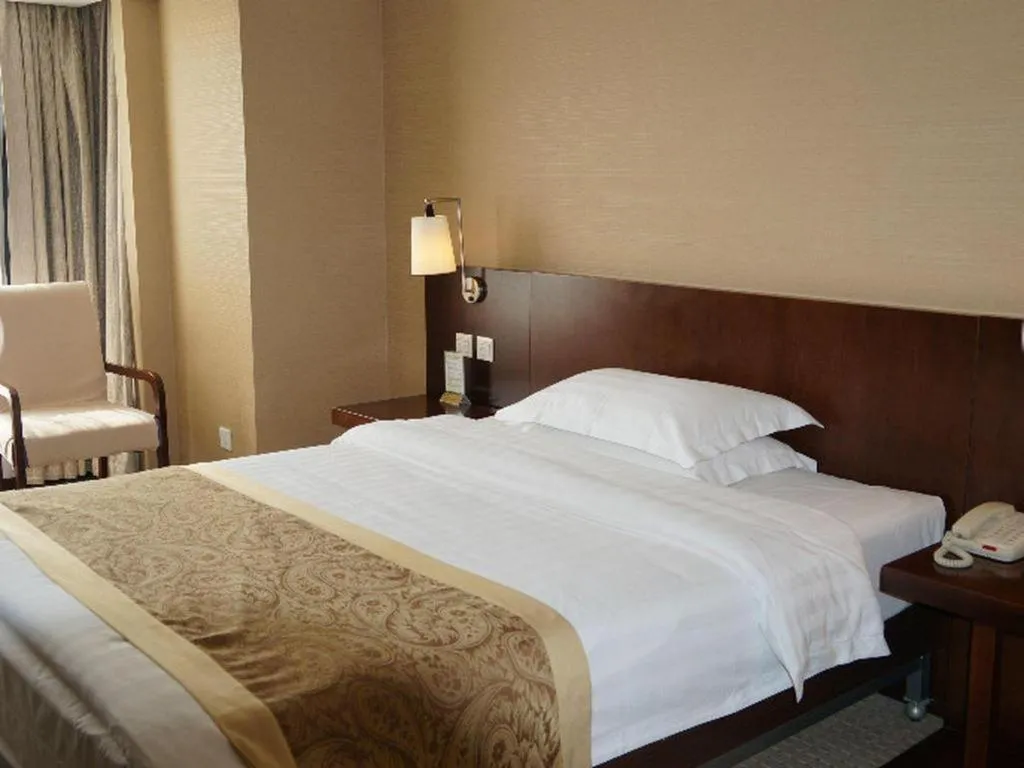 Bed in Dong Fang Hotel
