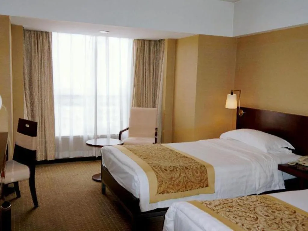 Bed in Dong Fang Hotel