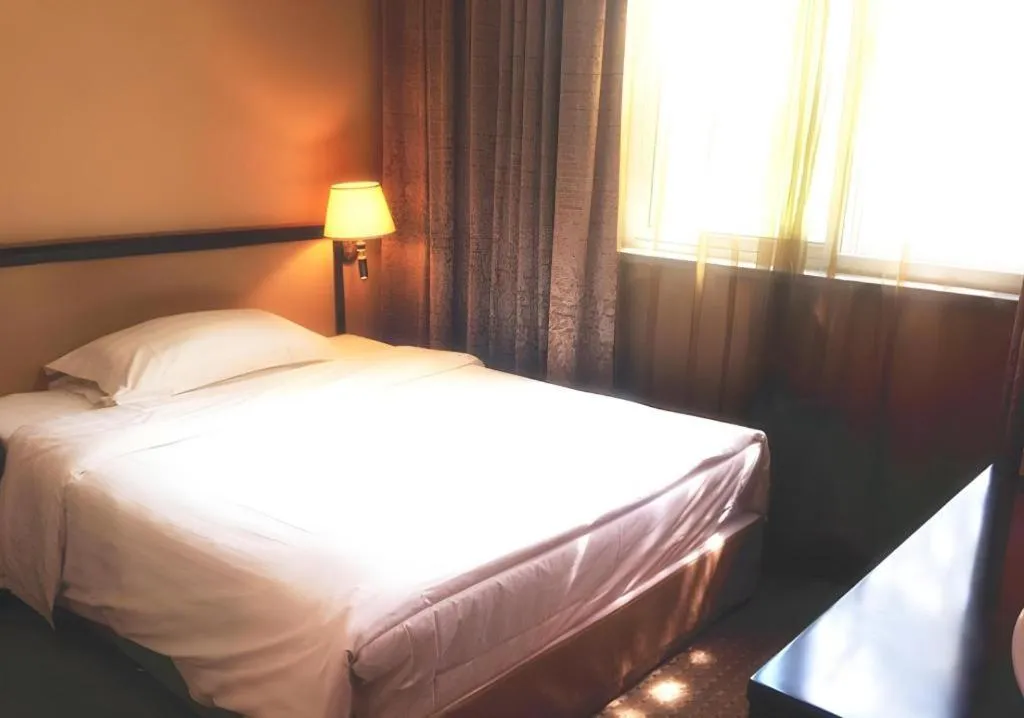 Bed in Dong Fang Hotel