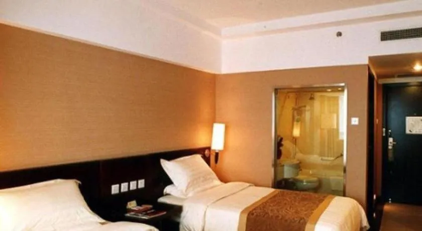 Bed in Dong Fang Hotel