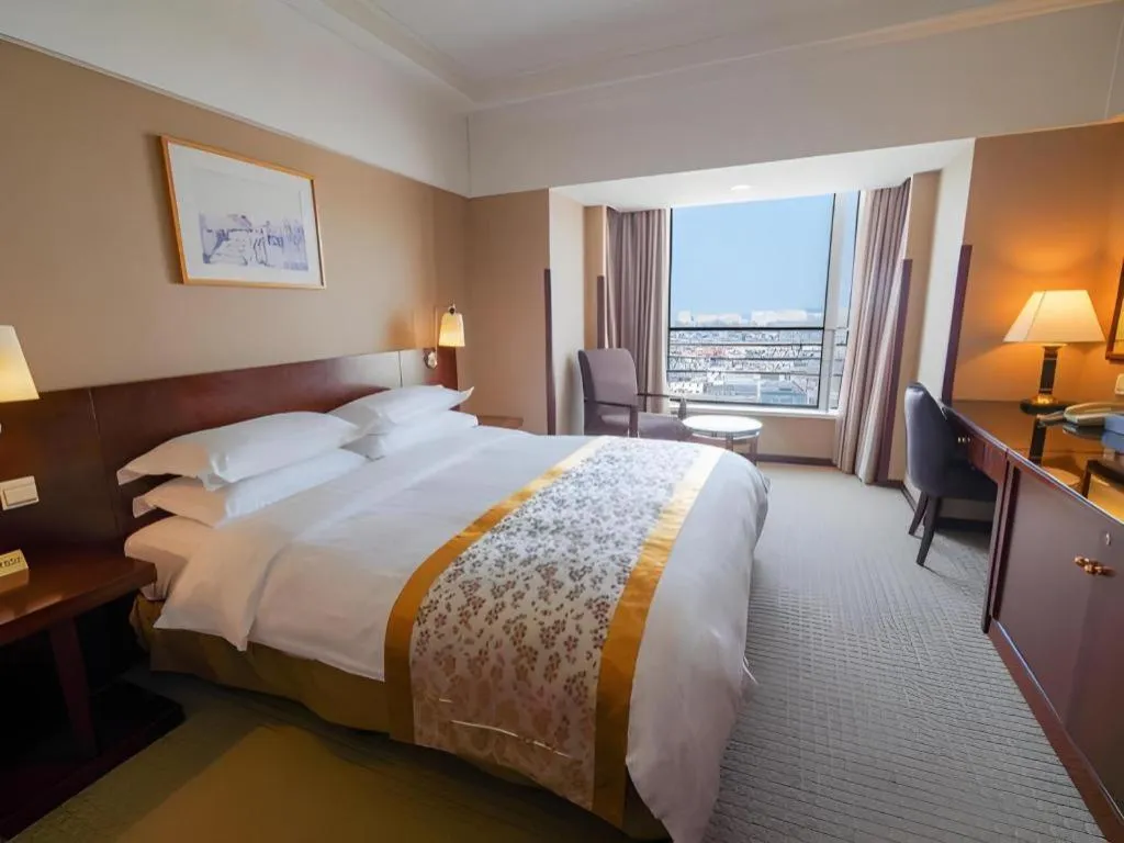 Bed in Dong Fang Hotel