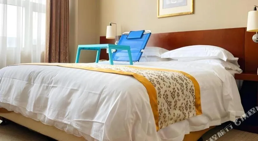 Bed in Dong Fang Hotel