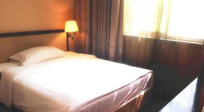 Bed in Dong Fang Hotel