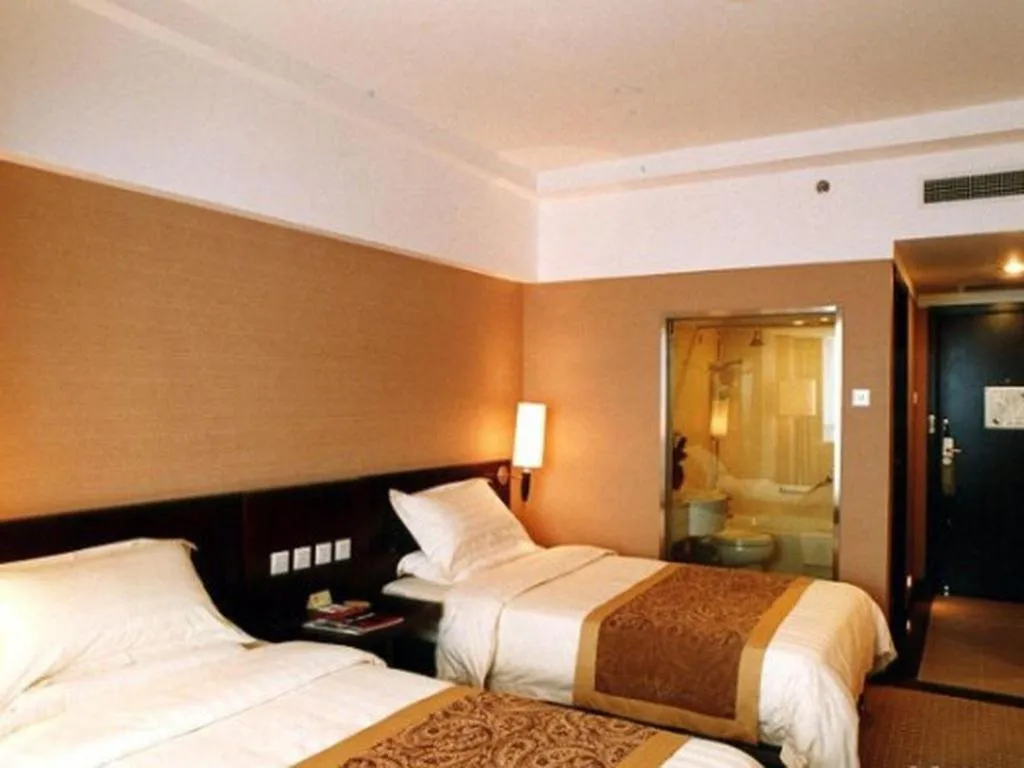 Bed in Dong Fang Hotel