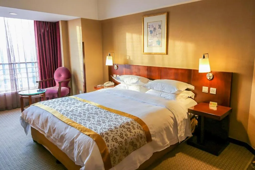 Bed in Dong Fang Hotel