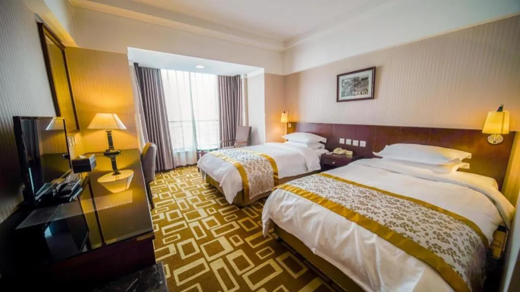 Bed in Dong Fang Hotel