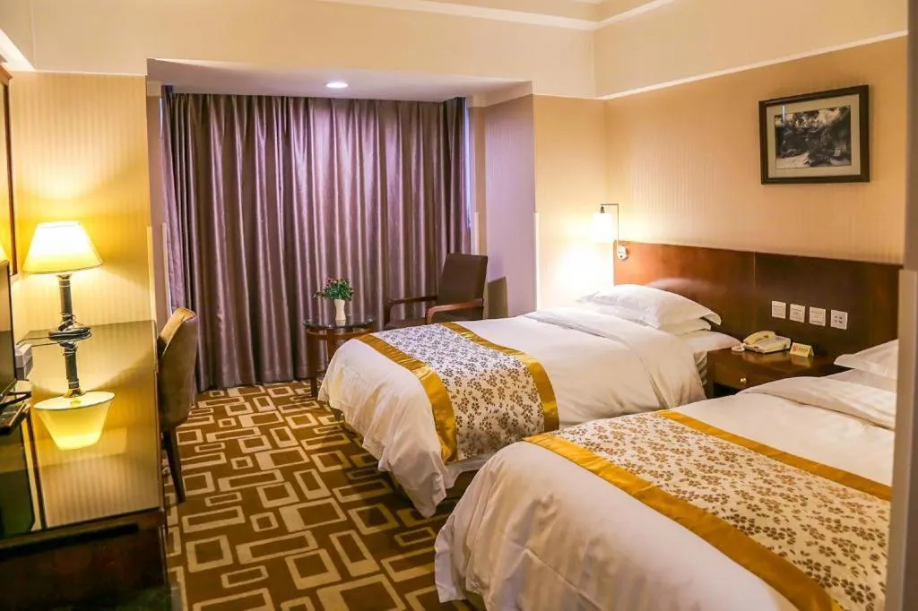 Bed in Dong Fang Hotel