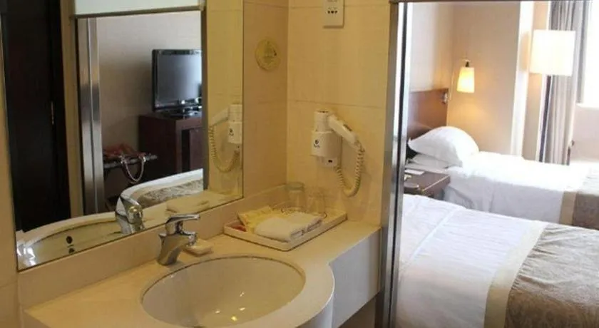 Bed in Dong Fang Hotel