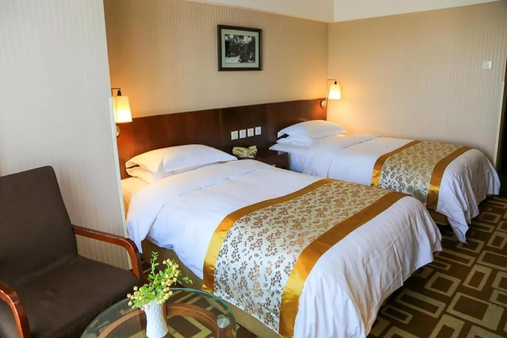 Bed in Dong Fang Hotel