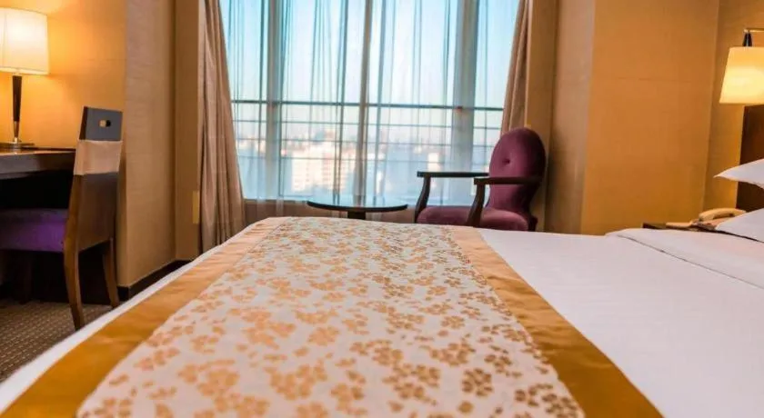 Bed in Dong Fang Hotel