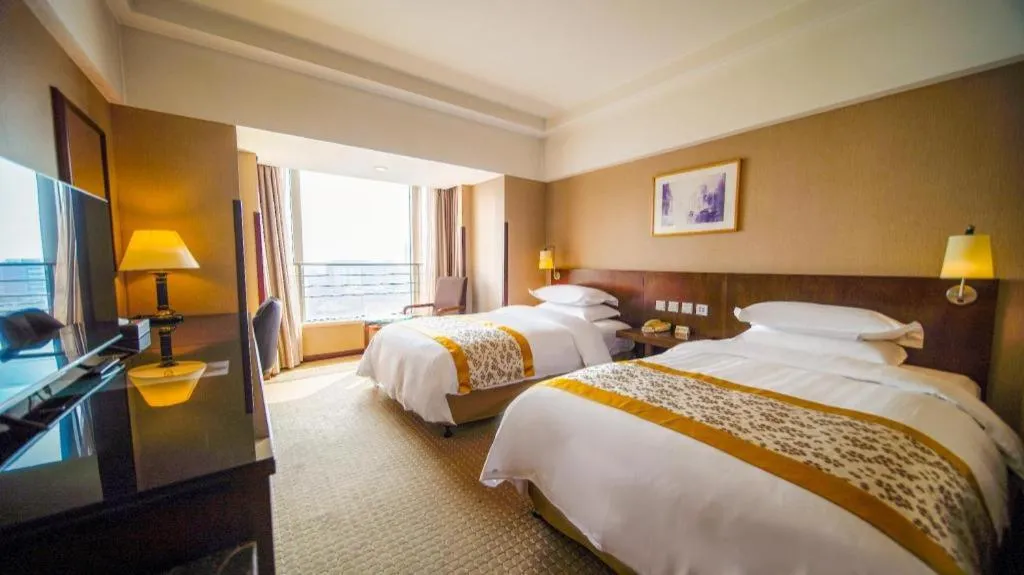 Bed in Dong Fang Hotel