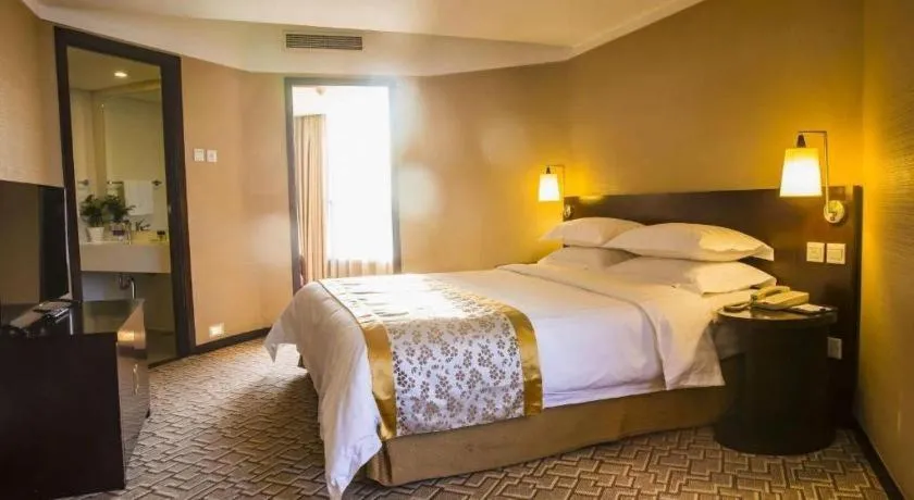 Bed in Dong Fang Hotel