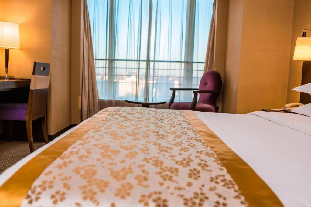 Bed in Dong Fang Hotel