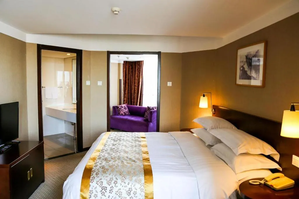 Bed in Dong Fang Hotel