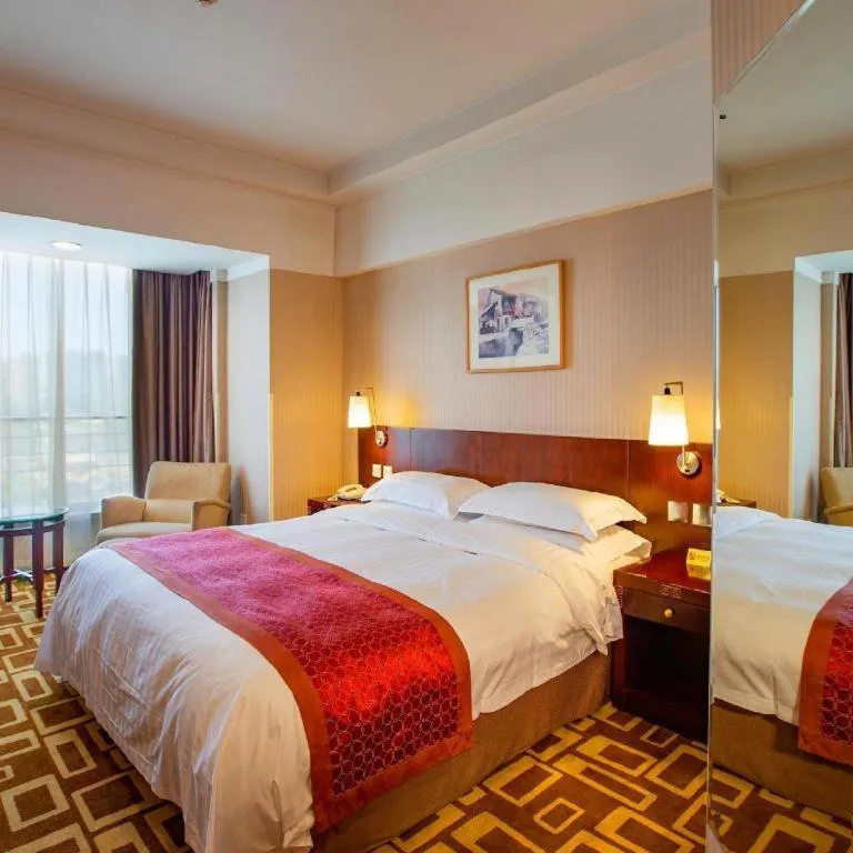 Bed in Dong Fang Hotel