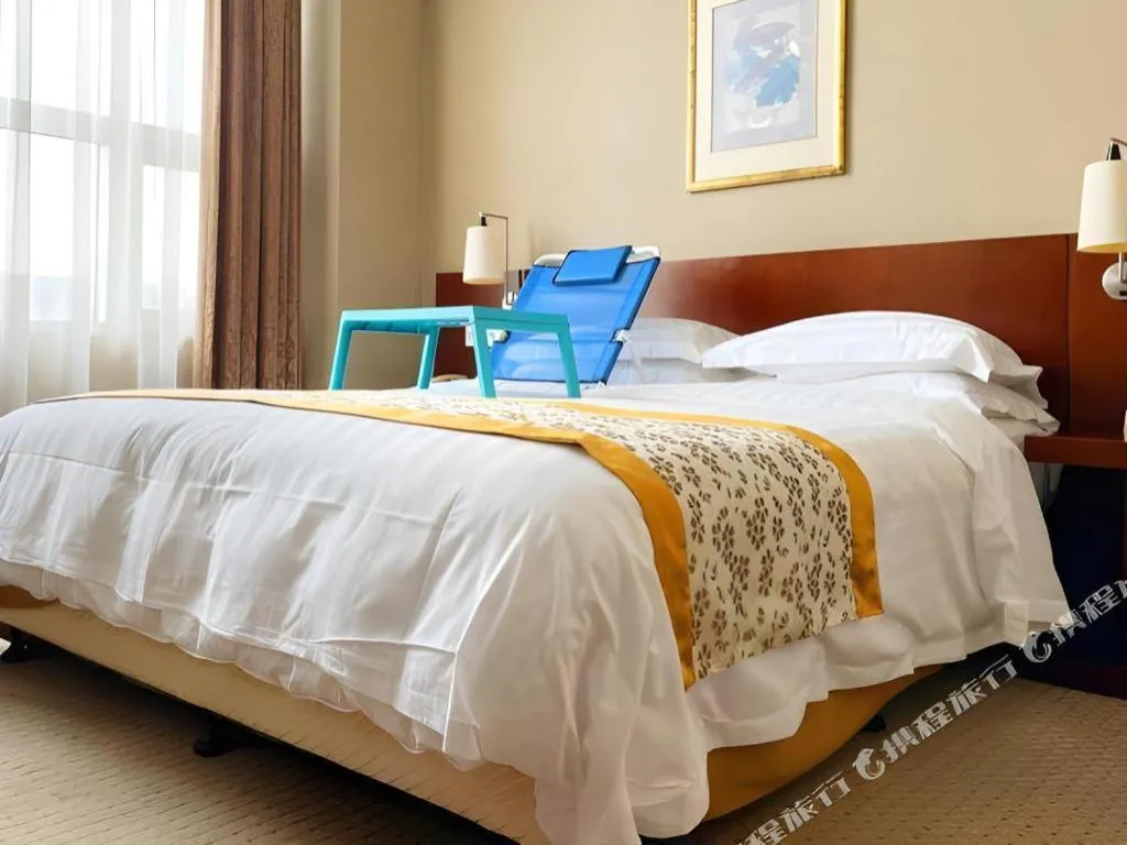 Bed in Dong Fang Hotel