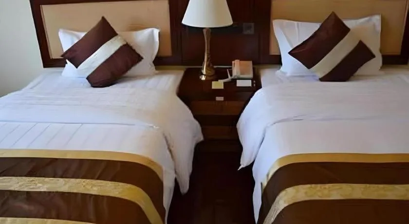 Bed in Kunming Tailong Hongrui Hotel