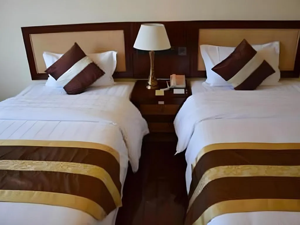 Bed in Kunming Tailong Hongrui Hotel