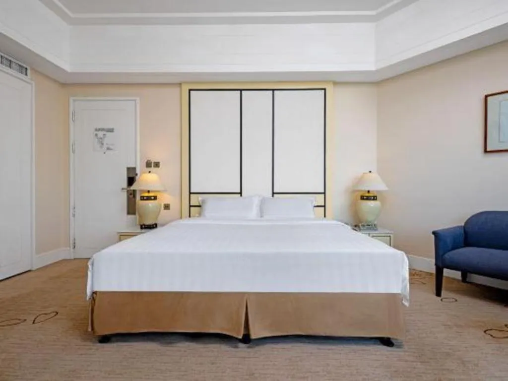 Bed in Hainan Junhua Haiyi Hotel