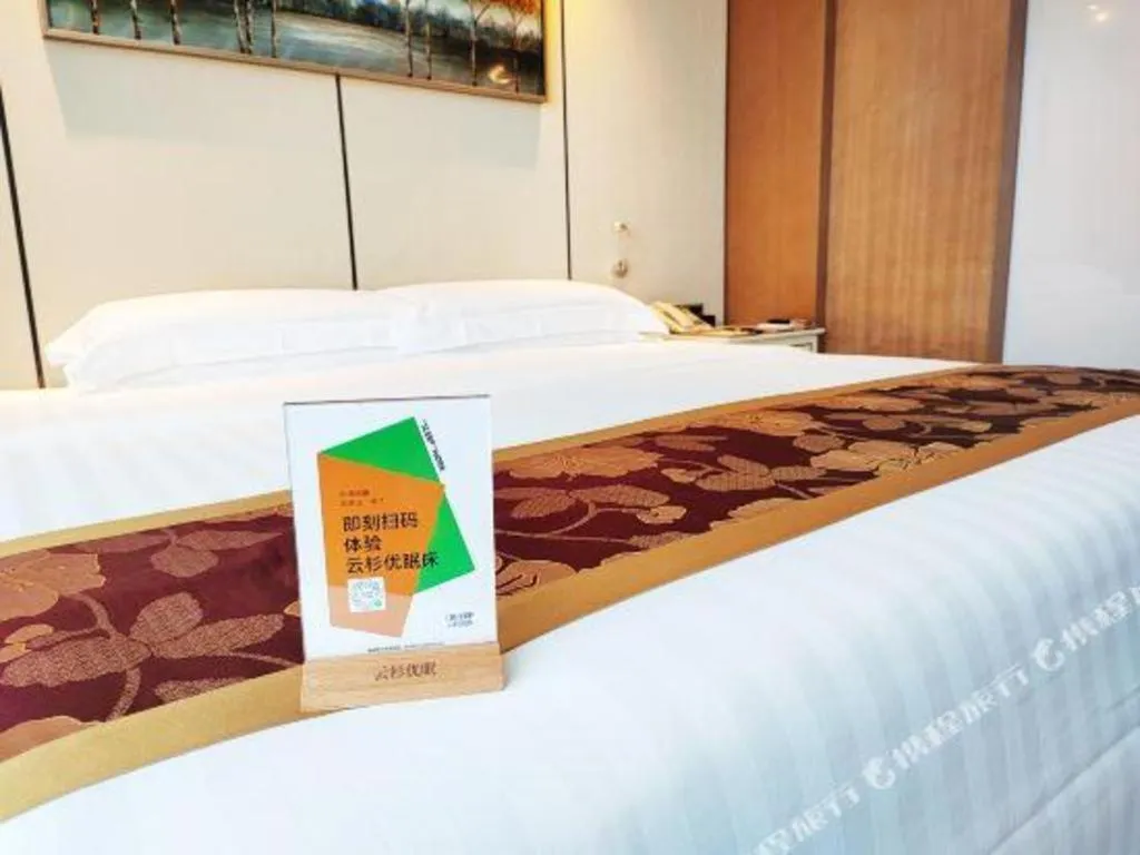 Bed in Hainan Junhua Haiyi Hotel