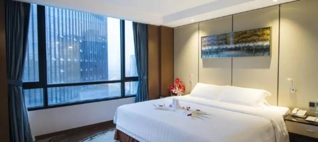 Bed in Hainan Junhua Haiyi Hotel