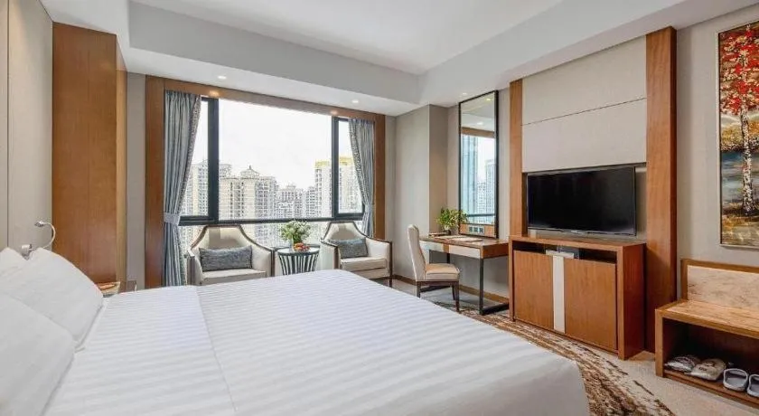 Bed in Hainan Junhua Haiyi Hotel