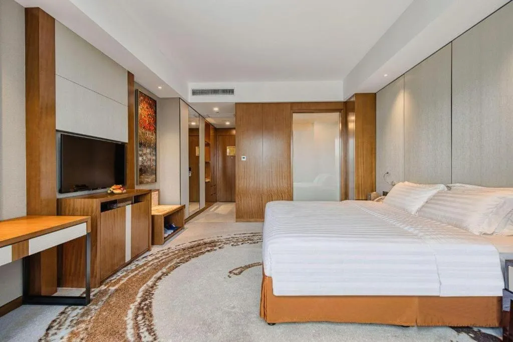 Bed in Hainan Junhua Haiyi Hotel