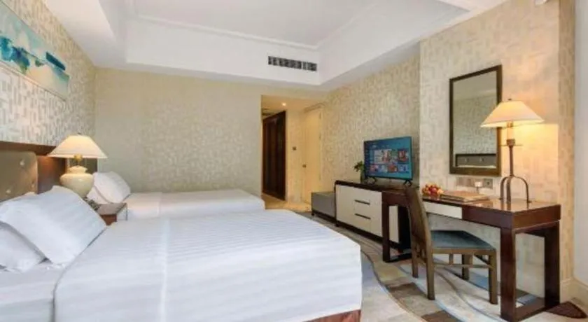 Bed in Hainan Junhua Haiyi Hotel