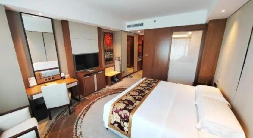 Bed in Hainan Junhua Haiyi Hotel