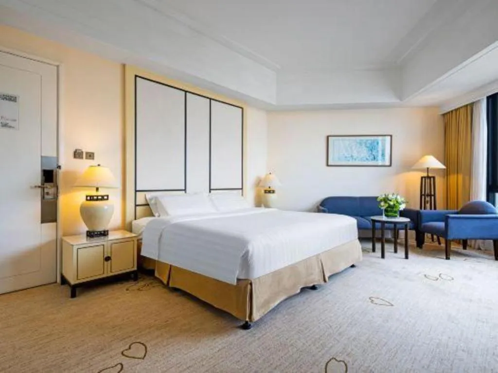 Bed in Hainan Junhua Haiyi Hotel