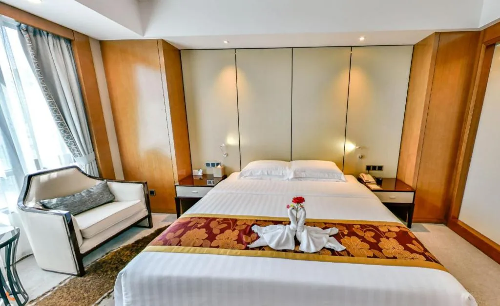 Bed in Hainan Junhua Haiyi Hotel