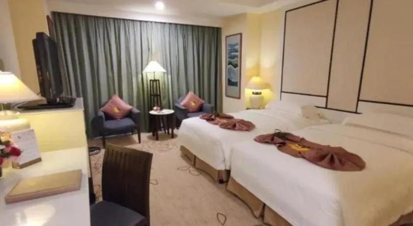 Bed in Hainan Junhua Haiyi Hotel