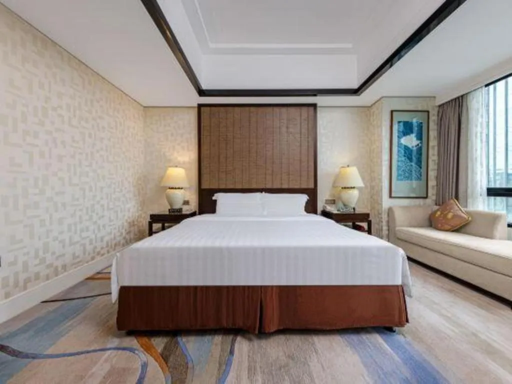 Bed in Hainan Junhua Haiyi Hotel