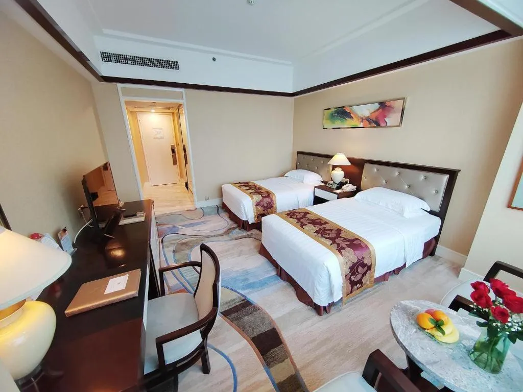 Bed in Hainan Junhua Haiyi Hotel