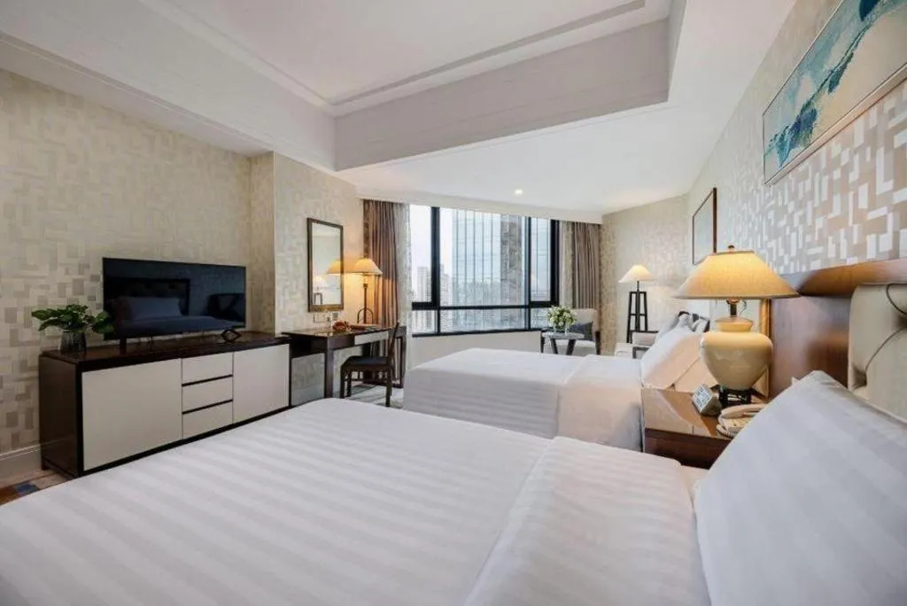 Bed in Hainan Junhua Haiyi Hotel